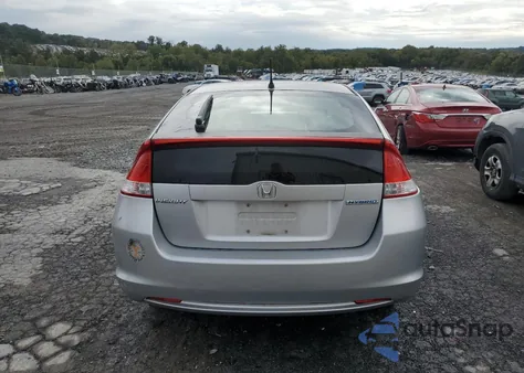 2010 Honda Insight Ex z USA, uszkodzony, nr VIN JHMZE2H79AS034030